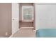 Bedroom with built in desk and closet, offering a functional space to work and rest at 202 Howland Ave, Cary, NC 27513