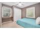 Comfortable bedroom with natural light, closet, and space for rest and relaxation at 202 Howland Ave, Cary, NC 27513