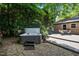 Backyard hot tub next to the deck and a brick house at 202 Howland Ave, Cary, NC 27513