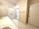 Bathroom featuring double sink vanity and glass enclosed shower at 211 Providence Glen, Chapel Hill, NC 27514