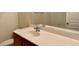 Bathroom vanity features a sink, mirror, and light countertop offering a functional space at 211 Providence Glen, Chapel Hill, NC 27514