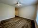 Bedroom with hardwood floors and neutral paint at 211 Providence Glen, Chapel Hill, NC 27514