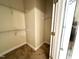 Bright walk-in closet featuring carpeted floors and wire shelving for optimal organization at 211 Providence Glen, Chapel Hill, NC 27514
