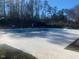 Large community swimming pool is surrounded by the clubhouse and a wooded area at 211 Providence Glen, Chapel Hill, NC 27514