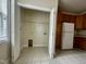 View of a laundry room equipped with storage space and washer/dryer hookups at 211 Providence Glen, Chapel Hill, NC 27514