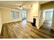 Bright living room with hardwood floors, fireplace, and open layout at 211 Providence Glen, Chapel Hill, NC 27514