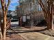 A metal gate leads to the pool in a wooded area; pool sign indicates 'No Lifeguard on Duty' at 211 Providence Glen, Chapel Hill, NC 27514