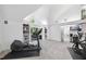 Bright exercise room features a vaulted ceiling, clerestory windows and built-in bookshelves at 2207 Vintage Hill Dr, Durham, NC 27712