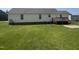 Spacious backyard with a small deck and ample green space at 224 Clearwater Dr, Smithfield, NC 27577