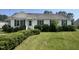Charming one-story home with green shutters and a well-maintained, lush front yard at 224 Clearwater Dr, Smithfield, NC 27577
