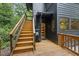 Exterior view of the home featuring a wooden staircase leading to the entrance at 2306 Damascus Church Rd, Chapel Hill, NC 27516