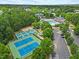 Overhead aerial view of community amenities including tennis courts and a swimming pool at 2419 Rogerson St, Raleigh, NC 27614