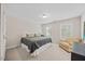 Bright bedroom with natural light featuring neutral colors, comfortable furnishings, and a cozy atmosphere at 2419 Rogerson St, Raleigh, NC 27614