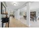 Spacious foyer showcases detailed trim, decorative columns, and views into the formal dining and living areas at 2419 Rogerson St, Raleigh, NC 27614