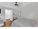 Cozy bedroom featuring a vanity area with a mirror and chair at 2528 Barwick Dr, Durham, NC 27704