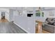 Comfortable living room area with hardwood floors and large windows overlooking backyard at 2528 Barwick Dr, Durham, NC 27704