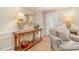 An inviting entryway showcases a stylish console table and a charming decor at 3012 Optimist Farm Rd, Apex, NC 27539