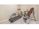 Exercise room featuring a treadmill, bicycle and inversion table for a complete workout at 3012 Optimist Farm Rd, Apex, NC 27539
