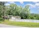Attractive home with a bright white fence creates a private backyard space at 3012 Optimist Farm Rd, Apex, NC 27539