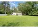 Wonderful two-story home featuring a balcony and a sprawling green lawn at 3012 Optimist Farm Rd, Apex, NC 27539
