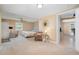 Spacious main bedroom with a ceiling fan, neutral tones, walk-in closet and an adjoining bathroom at 3012 Optimist Farm Rd, Apex, NC 27539