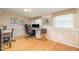 Bright home office with hardwood floors, neutral walls, and natural light at 3012 Optimist Farm Rd, Apex, NC 27539