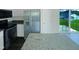 Kitchen features stainless steel appliances, modern countertops, and ample counter space at 308 Quartz Dr, Durham, NC 27703