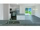 Kitchen features stainless steel appliances, modern countertops, and ample counter space at 308 Quartz Dr, Durham, NC 27703