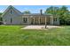 View of back of home showing large patio at 311 Rassie Crabtree Rd, Rougemont, NC 27572