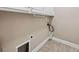 Unfinished basement with neutral flooring and white baseboards at 311 Rassie Crabtree Rd, Rougemont, NC 27572