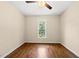 Bedroom features hardwood floors, neutral walls, and natural light at 311 Rassie Crabtree Rd, Rougemont, NC 27572