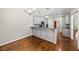 Kitchen with granite countertops and gray cabinets at 311 Rassie Crabtree Rd, Rougemont, NC 27572