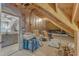 Unfinished attic space with exposed rafters, Thermo Ply walls, and storage area at 3111 Virginia Pine Ln, Apex, NC 27539