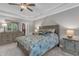 Cozy bedroom with neutral decor, ceiling fan, and -and- nightstands at 3111 Virginia Pine Ln, Apex, NC 27539