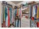 Walk-in closet with organized shelving and hanging rods for ample storage at 3111 Virginia Pine Ln, Apex, NC 27539