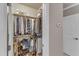 Walk-in closet with organized shelving and hanging rods for ample storage at 3111 Virginia Pine Ln, Apex, NC 27539