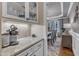 Elegant dining room with granite countertop and serving buffet with dining room view at 3111 Virginia Pine Ln, Apex, NC 27539