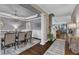 Elegant dining room with hardwood floors and a contemporary chandelier at 3111 Virginia Pine Ln, Apex, NC 27539