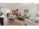 Spacious open living area with kitchen and dining space view, filled with sunlight at 336 Skymont Dr, Holly Springs, NC 27540