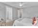 Neutral bedroom with carpet, ceiling fan, and an ensuite bathroom at 425 Morrison Ave, Raleigh, NC 27608
