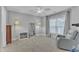 Spacious bedroom with gray walls, carpet flooring, ceiling fan, and plenty of natural light at 425 Morrison Ave, Raleigh, NC 27608
