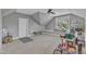 Spacious bonus room featuring neutral walls and carpet, a window seat, and ceiling fan at 425 Morrison Ave, Raleigh, NC 27608