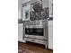 Stainless steel oven in an updated kitchen with white cabinets and sleek countertops at 425 Morrison Ave, Raleigh, NC 27608
