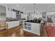Modern kitchen with white cabinetry, dark countertops, and stainless steel appliances at 425 Morrison Ave, Raleigh, NC 27608