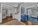 Open-concept living area showcasing hardwood floors, stylish furnishings, and abundant natural light at 425 Morrison Ave, Raleigh, NC 27608
