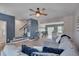Cozy living room with an open layout, hardwood floors, and easy access to other living spaces at 445 Brier Summit Pl, Durham, NC 27703