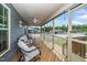 Relaxing back porch with comfortable seating and a ceiling fan, perfect for enjoying the outdoors at 45 Imperial Dr, Clayton, NC 27527