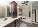 Bathroom boasts double sink vanity, soaking tub, and walk-in shower with glass door at 45 Imperial Dr, Clayton, NC 27527