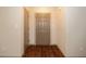 Entryway with hardwood floors and gray doors, leading to various rooms in the home at 45 Imperial Dr, Clayton, NC 27527