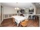 Open concept living and dining rooms with wood floors and seamless flow at 45 Imperial Dr, Clayton, NC 27527